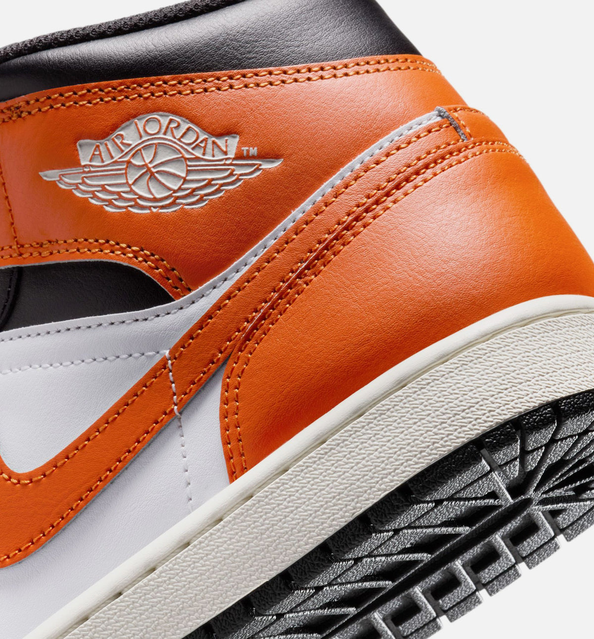Air Jordan 1 Mid Mens Lifestyle Shoe - StarfishWhiteSailBlack